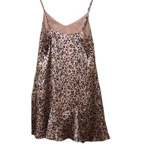 Size M. Animal print silky dress!  New without tags!